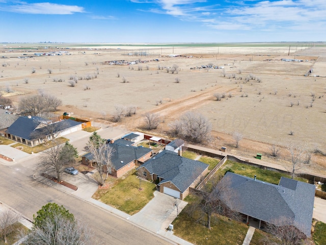 bird's eye view with a desert view