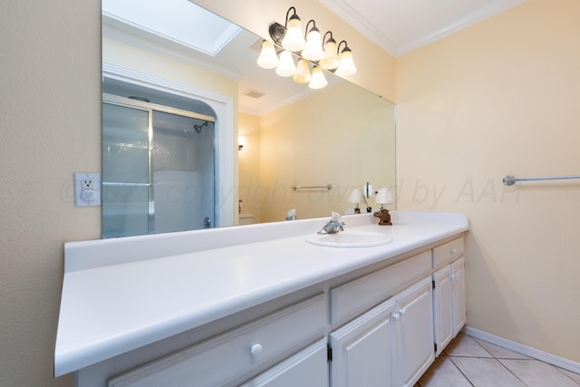 full bathroom featuring vanity, visible vents, a stall shower, ornamental molding, and tile patterned flooring