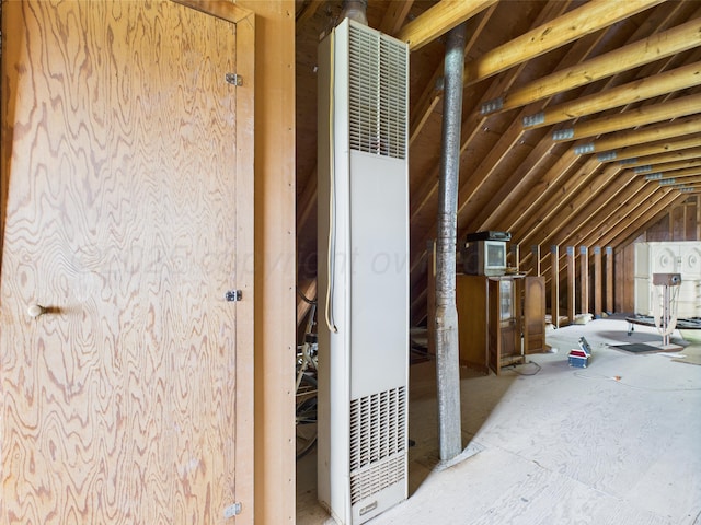 1108 Campanella Dr, Pampa, TX 79065 - unfinished attic featuring a heating unit