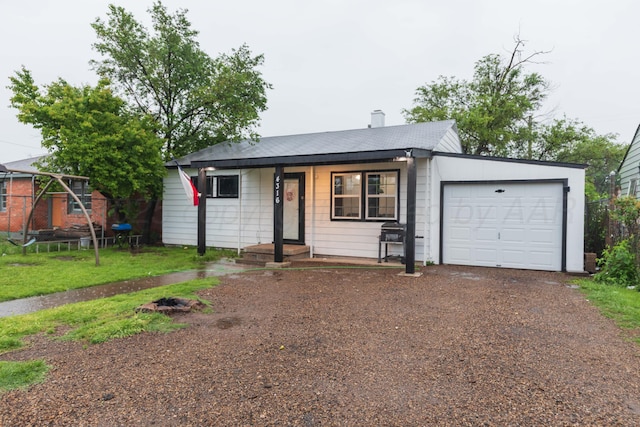 4316 SE 15th Ave, Amarillo, TX 79104 - ranch-style home with covered porch, a garage, a chimney, dirt driveway, and a shingled roof