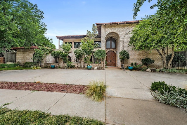 7402 Lynnlee Pl, Amarillo, TX 79121 - mediterranean / spanish-style house featuring brick siding