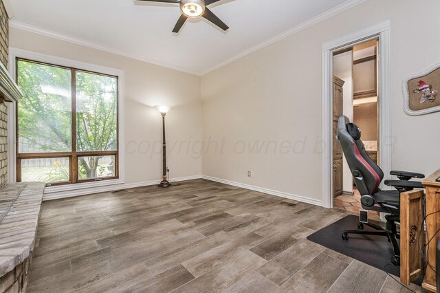 7402 Lynnlee Pl, Amarillo, TX 79121 - office area with a ceiling fan, wood finished floors, healthy amount of natural light, and ornamental molding
