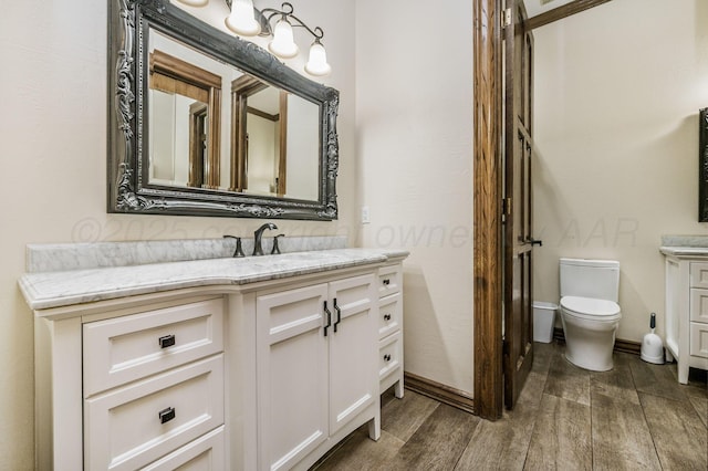 7402 Lynnlee Pl, Amarillo, TX 79121 - bathroom with vanity and wood finished floors