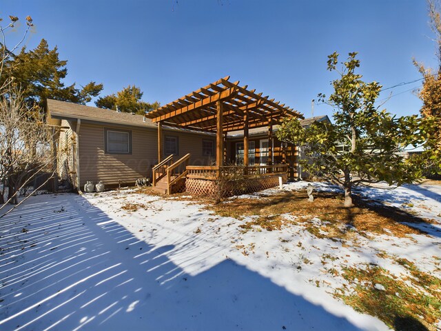 1924 N Dwight St, Pampa, TX 79065 - view of front facade featuring a wooden deck and a pergola
