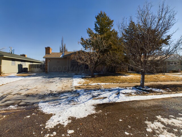 1924 N Dwight St, Pampa, TX 79065 - view of front of home featuring a chimney