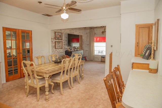400 W 7th St, Panhandle, TX 79068 - dining room featuring ceiling fan, french doors, and light colored carpet