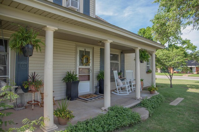 400 W 7th St, Panhandle, TX 79068 - entrance to property featuring a porch and a yard