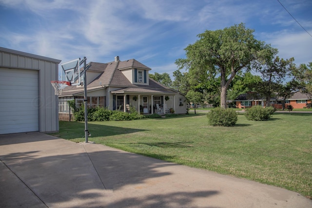 400 W 7th St, Panhandle, TX 79068 - victorian-style house with covered porch, a front yard, a garage, and concrete driveway