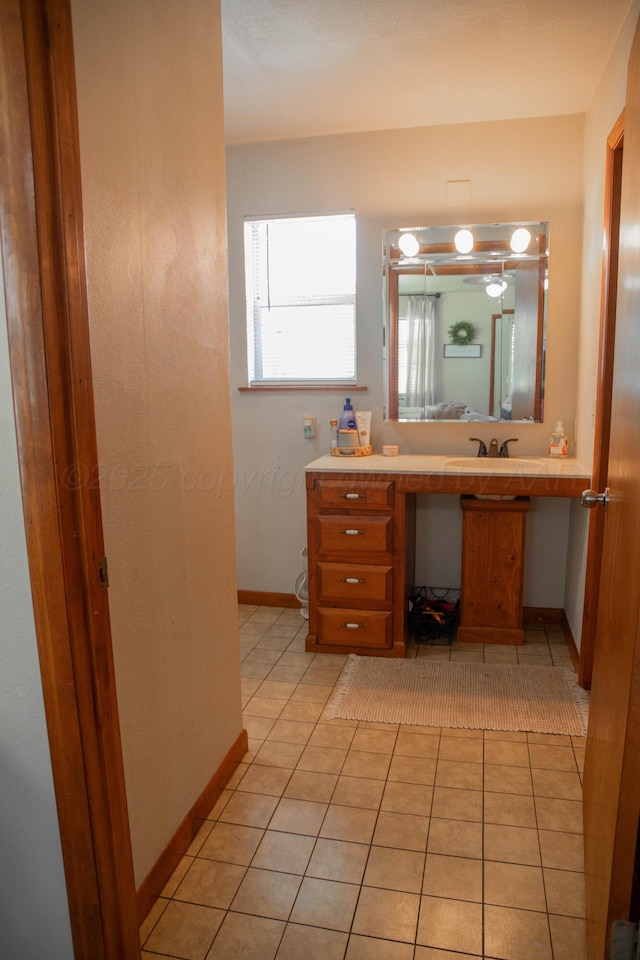 400 W 7th St, Panhandle, TX 79068 - bathroom featuring vanity and tile patterned flooring