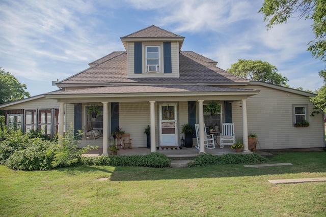 400 W 7th St, Panhandle, TX 79068 - farmhouse inspired home with roof with shingles, a porch, a front lawn, and cooling unit
