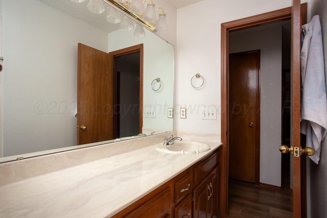 8001 Arbor St, Amarillo, TX 79110 - bathroom featuring vanity and wood finished floors