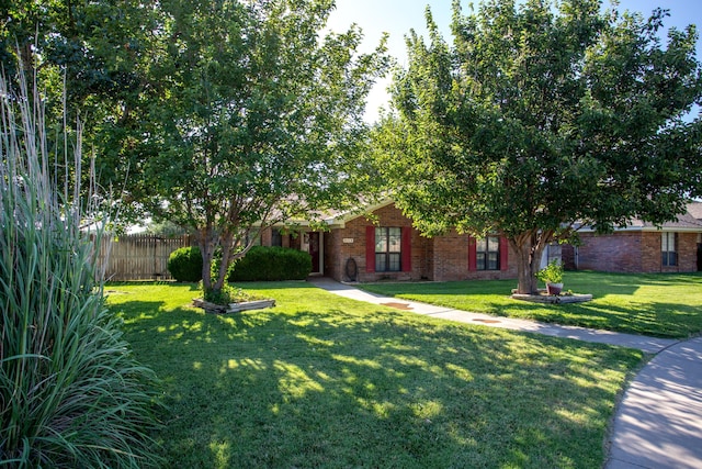 8001 Arbor St, Amarillo, TX 79110 - view of property hidden behind natural elements featuring brick siding