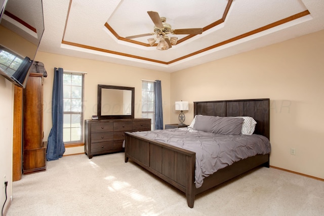 8001 Arbor St, Amarillo, TX 79110 - bedroom with a raised ceiling, light colored carpet, and a ceiling fan