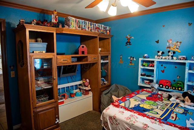 carpeted bedroom featuring ceiling fan and crown molding