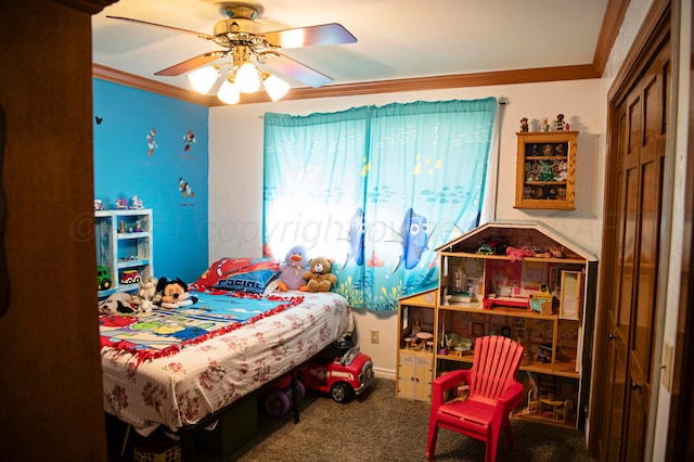 bedroom featuring ornamental molding, carpet floors, and ceiling fan