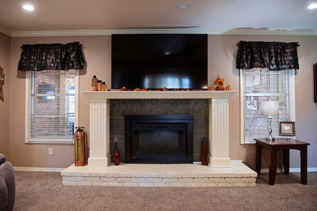 room details with a fireplace, carpet, and crown molding