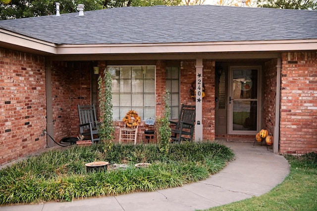 doorway to property featuring a porch