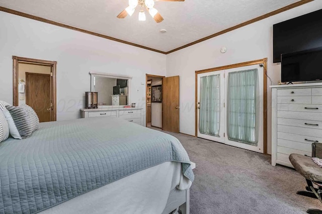 bedroom featuring ornamental molding, a ceiling fan, and light colored carpet