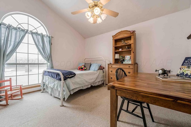 bedroom with carpet, vaulted ceiling, and ceiling fan