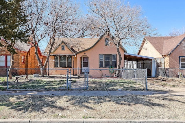 view of front of home with a carport