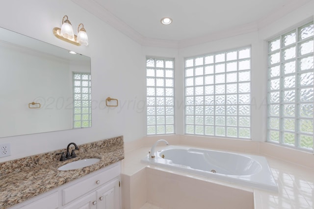full bath with a garden tub, crown molding, a wealth of natural light, and vanity