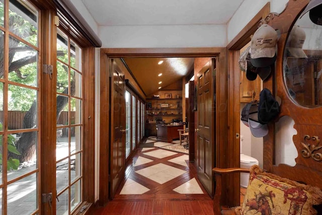 2200 Parker St, Amarillo, TX 79109 - corridor with french doors, vaulted ceiling, and inlaid floor details