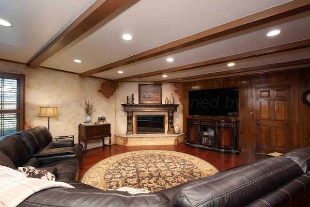 2200 Parker St, Amarillo, TX 79109 - living room with wood finished floors, beam ceiling, a glass covered fireplace, and recessed lighting