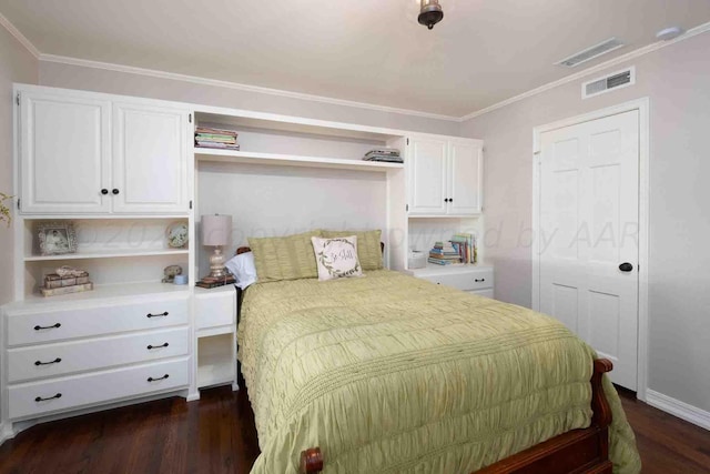 2200 Parker St, Amarillo, TX 79109 - bedroom with dark wood-type flooring, crown molding, and baseboards