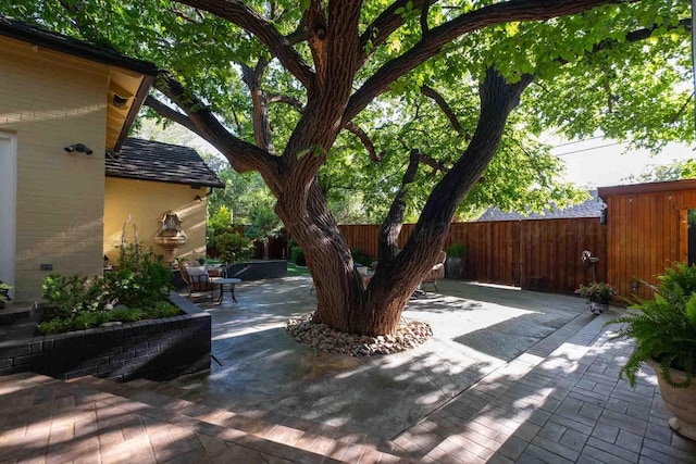 2200 Parker St, Amarillo, TX 79109 - fenced backyard featuring a patio