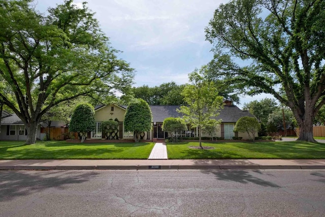 2200 Parker St, Amarillo, TX 79109 - view of property hidden behind natural elements featuring a front yard