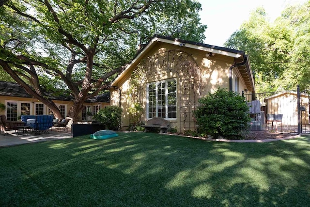 2200 Parker St, Amarillo, TX 79109 - rear view of house with a patio