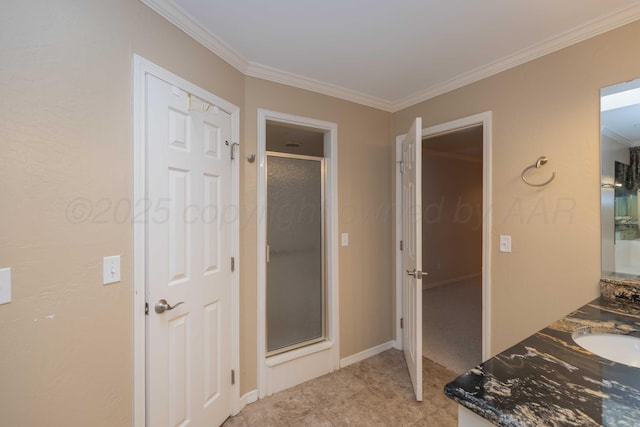 corridor with crown molding and sink