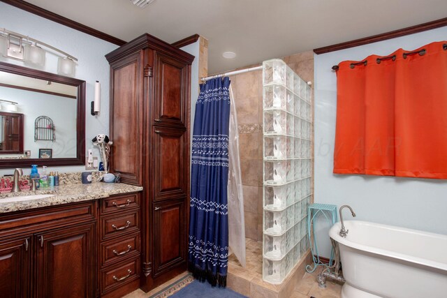 2900 Teckla Blvd, Amarillo, TX 79106 - bathroom featuring vanity, tiled shower, a freestanding bath, and ornamental molding