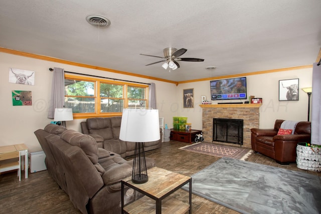 2900 Teckla Blvd, Amarillo, TX 79106 - living room with ornamental molding, ceiling fan, a fireplace, and a textured ceiling