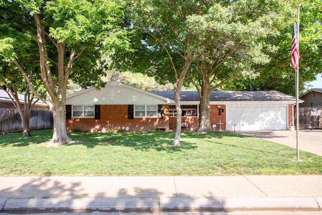 2900 Teckla Blvd, Amarillo, TX 79106 - ranch-style house with brick siding, concrete driveway, and a garage