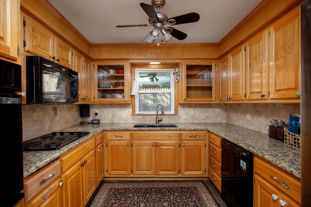 2900 Teckla Blvd, Amarillo, TX 79106 - kitchen with black appliances, decorative backsplash, ceiling fan, light stone countertops, and ornamental molding