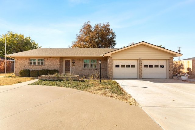 single story home featuring a garage