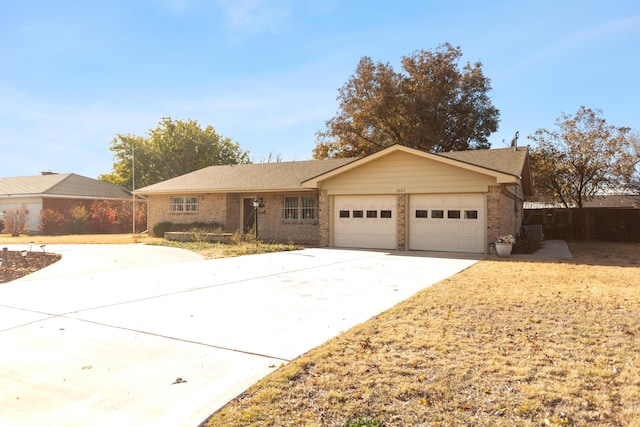 ranch-style home with a garage