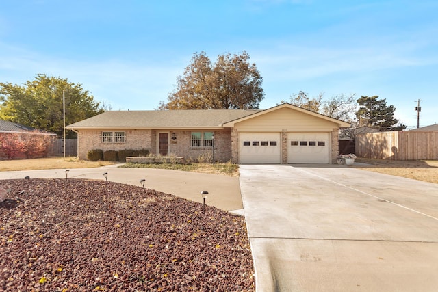 single story home with a garage