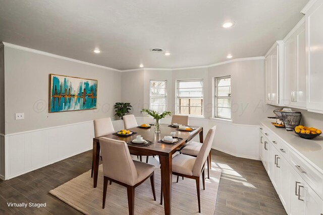 3506 Barclay Dr, Amarillo, TX 79109 - dining space with wood finished floors, ornamental molding, wainscoting, and recessed lighting