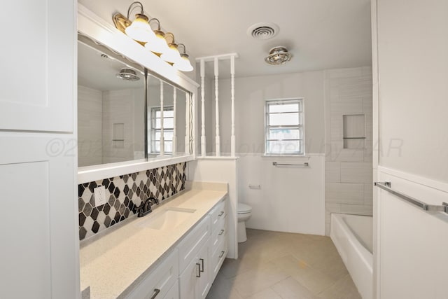 3506 Barclay Dr, Amarillo, TX 79109 - full bath with vanity, decorative backsplash, and tile patterned floors