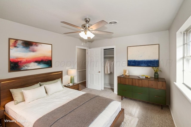 3506 Barclay Dr, Amarillo, TX 79109 - bedroom featuring a closet, light carpet, multiple windows, and ceiling fan