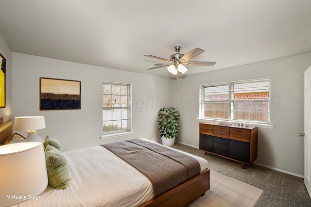 3506 Barclay Dr, Amarillo, TX 79109 - carpeted bedroom featuring multiple windows and a ceiling fan