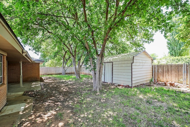 3506 Barclay Dr, Amarillo, TX 79109 - fenced backyard featuring a storage shed