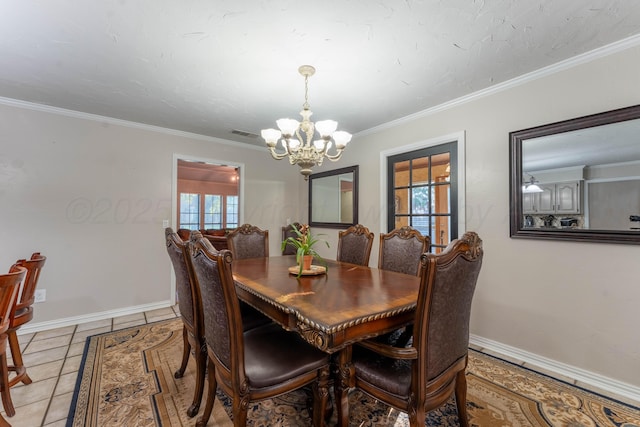 6211 Edgeware Pl, Amarillo, TX 79109 - dining area featuring a chandelier, light tile patterned flooring, and crown molding