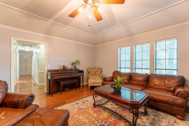 6211 Edgeware Pl, Amarillo, TX 79109 - living room featuring wood finished floors, ceiling fan, and crown molding