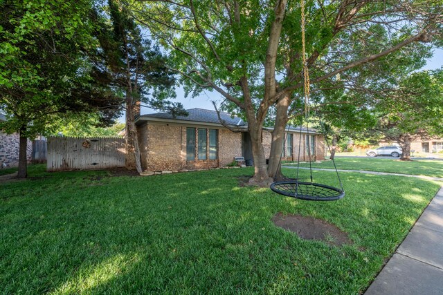 6211 Edgeware Pl, Amarillo, TX 79109 - view of front facade with brick siding