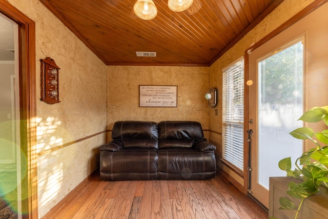 6211 Edgeware Pl, Amarillo, TX 79109 - sitting room with hardwood / wood-style floors, crown molding, wooden ceiling, and lofted ceiling