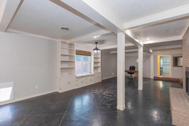 unfurnished living room featuring a brick fireplace, a textured ceiling, crown molding, beam ceiling, and built in features