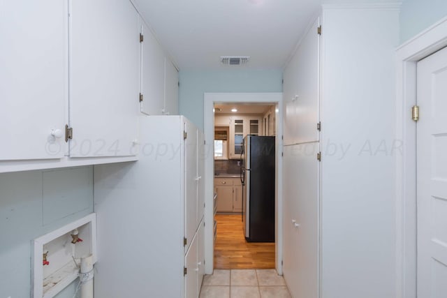 interior space with light tile patterned flooring